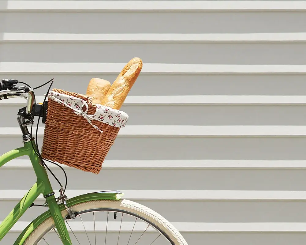 Linea weatherboard horizontal fibre cement boards on an exterior wall with bicycle in foreground